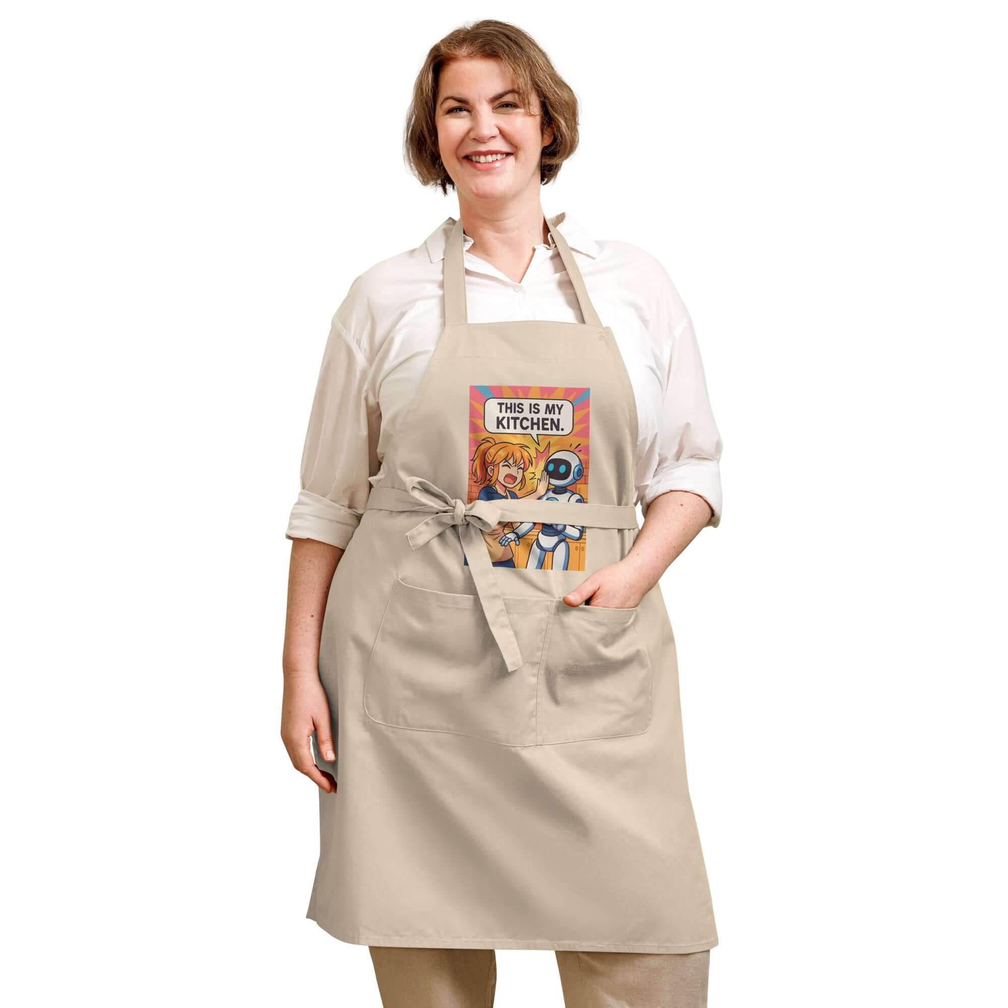 Smiling woman in an organic cotton apron with cartoon design, perfect for cooking fun! Organic cotton apron.